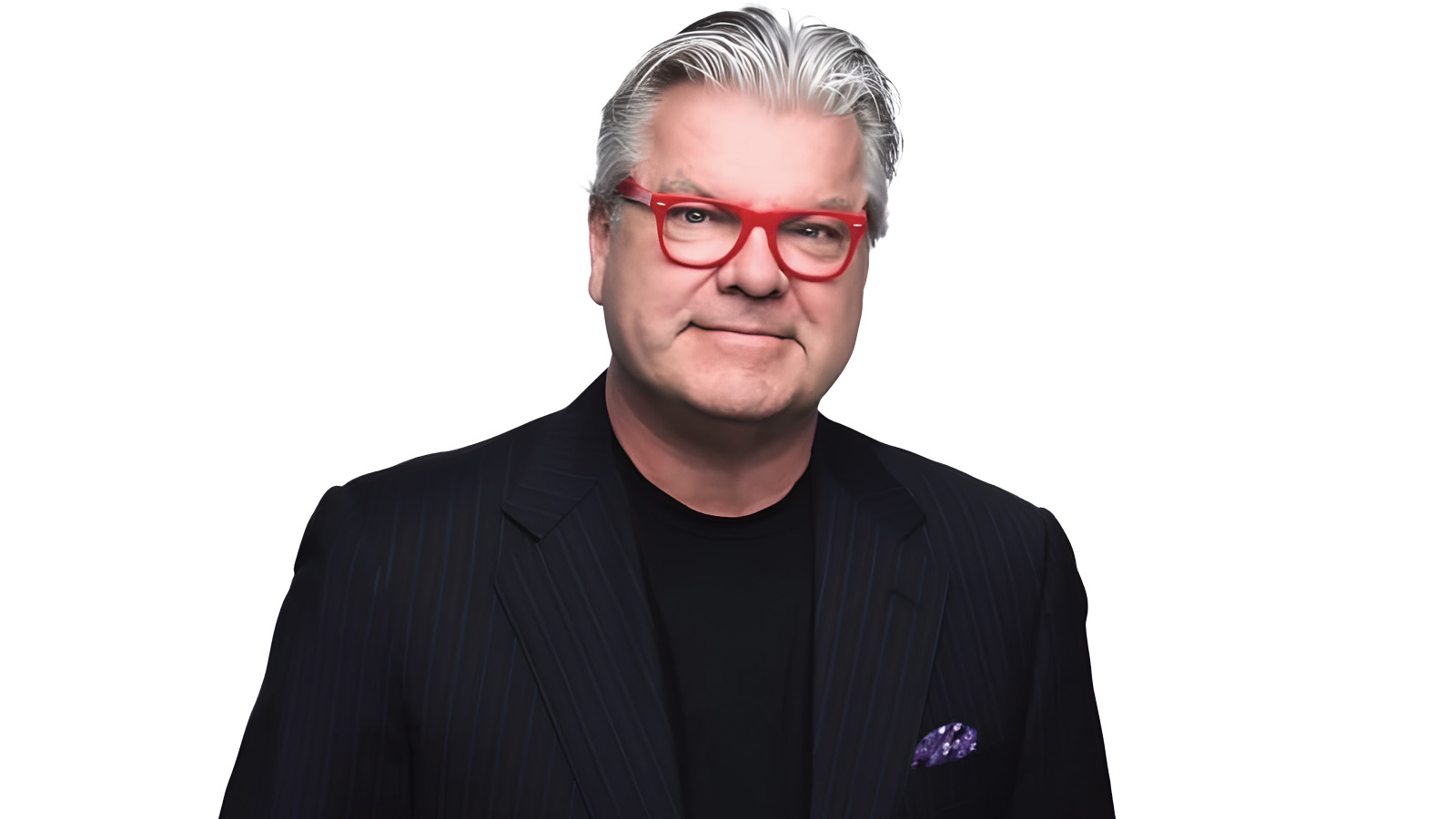 Gene Valaitis wearing black suit jacket and red glasses