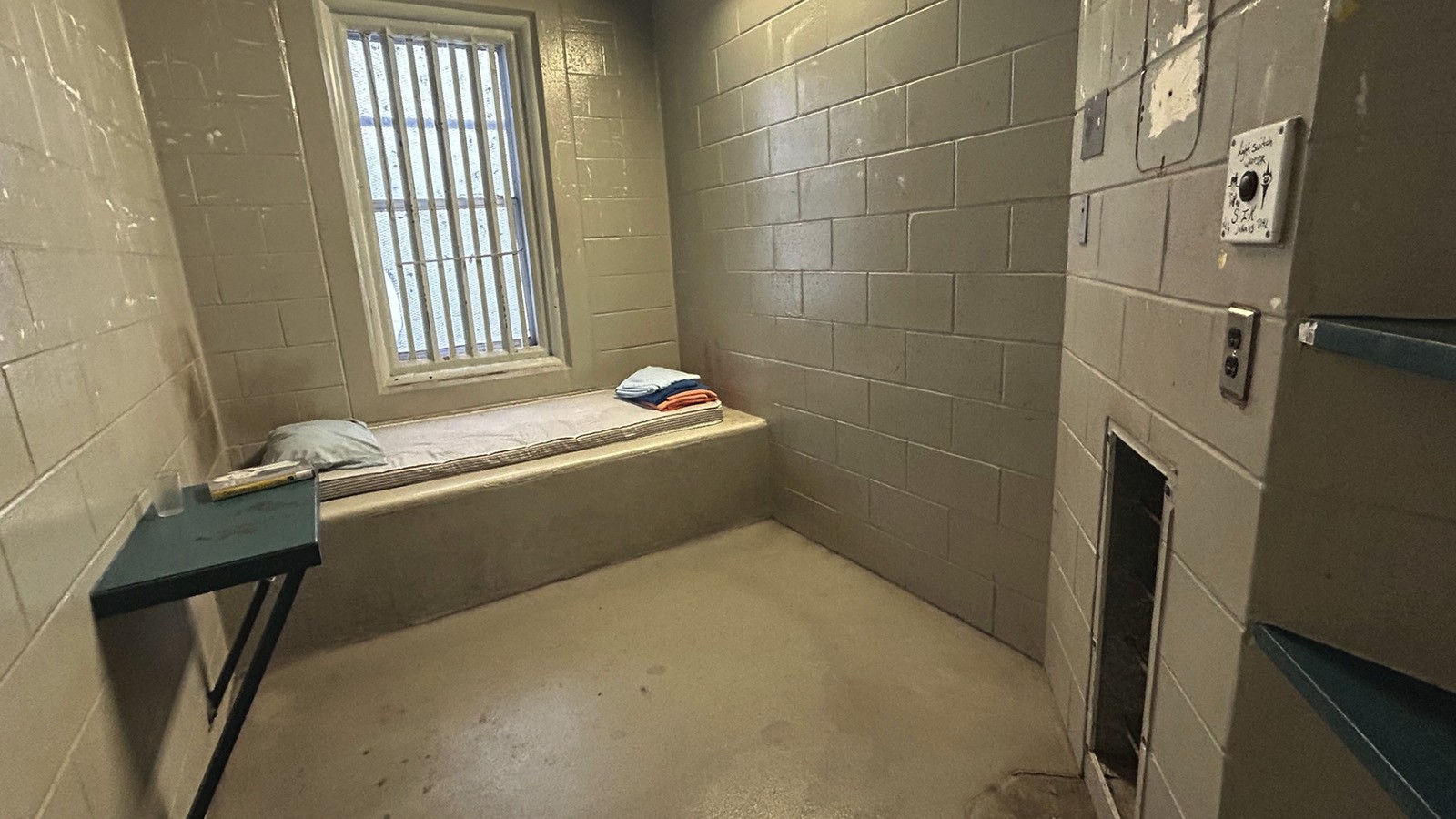 Image shows a prison cell
