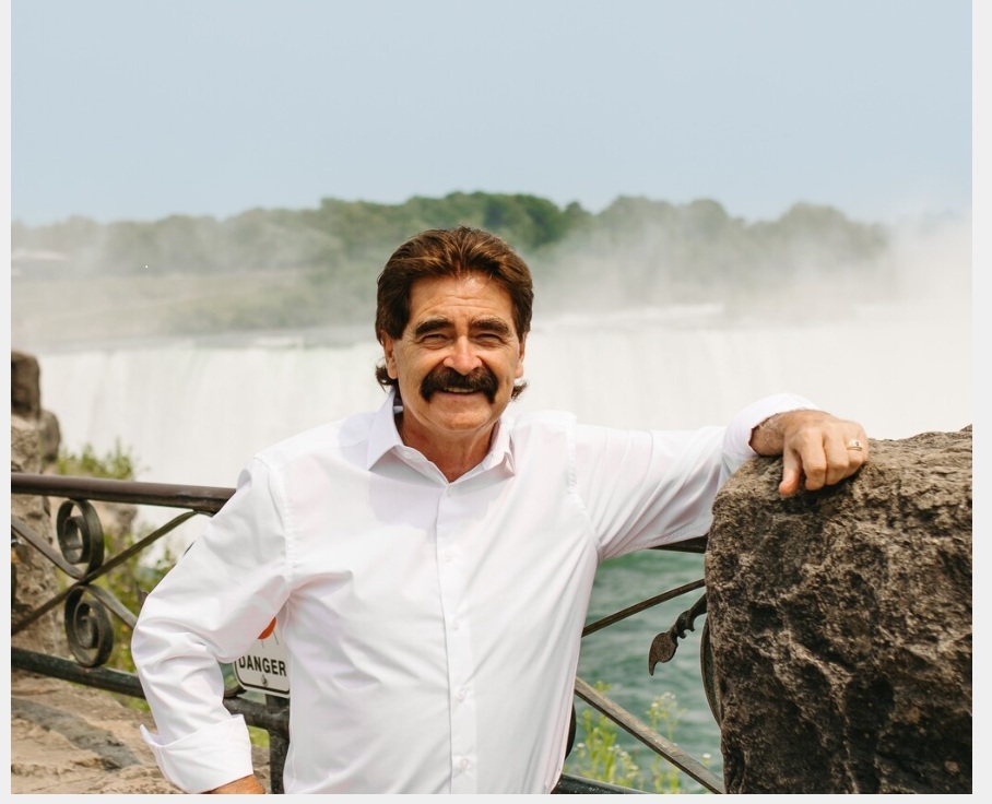 Image of Wayne Gates in front of Niagara Falls