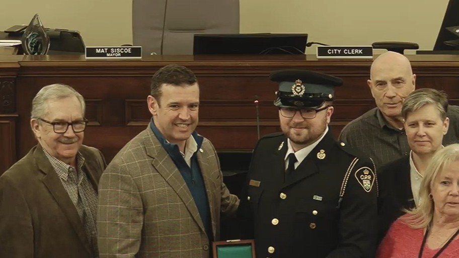 Aiden Loughlin poses for picture with councillors and Mayor Mat Siscoe