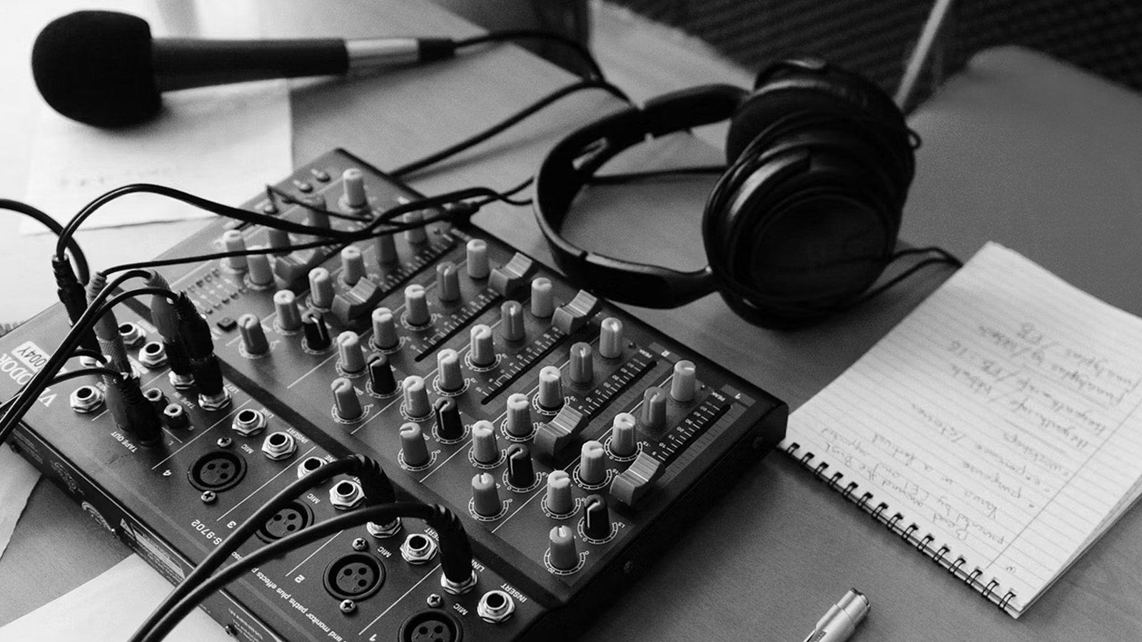Image of microphone, headphones and radio equipment