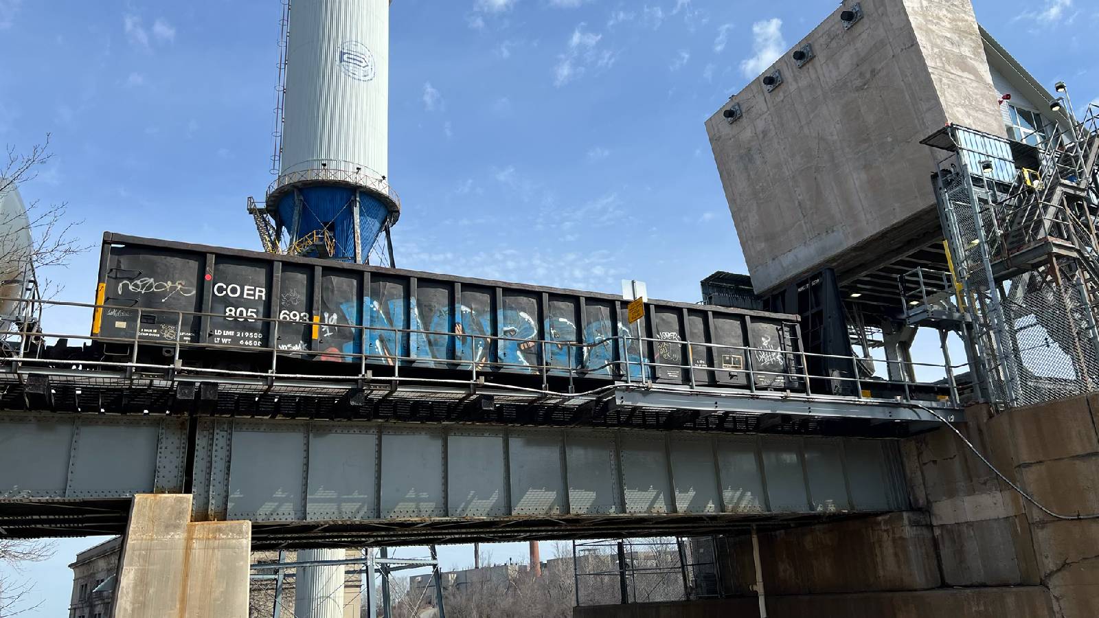 Image of train car stuck on bridge