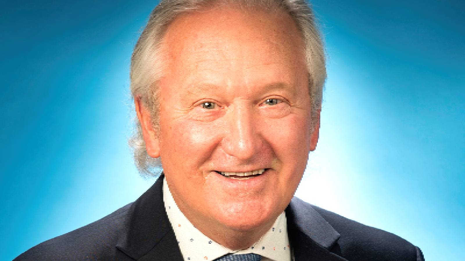 Image of the Mayor smiling at camera