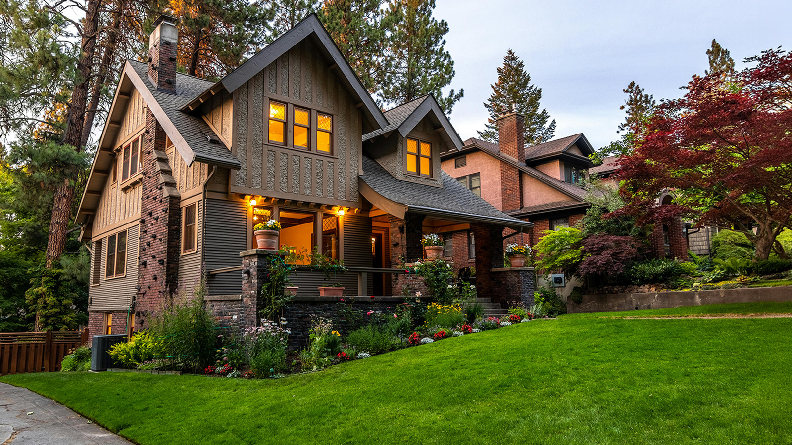 Image of upscale home with nice green front lawn